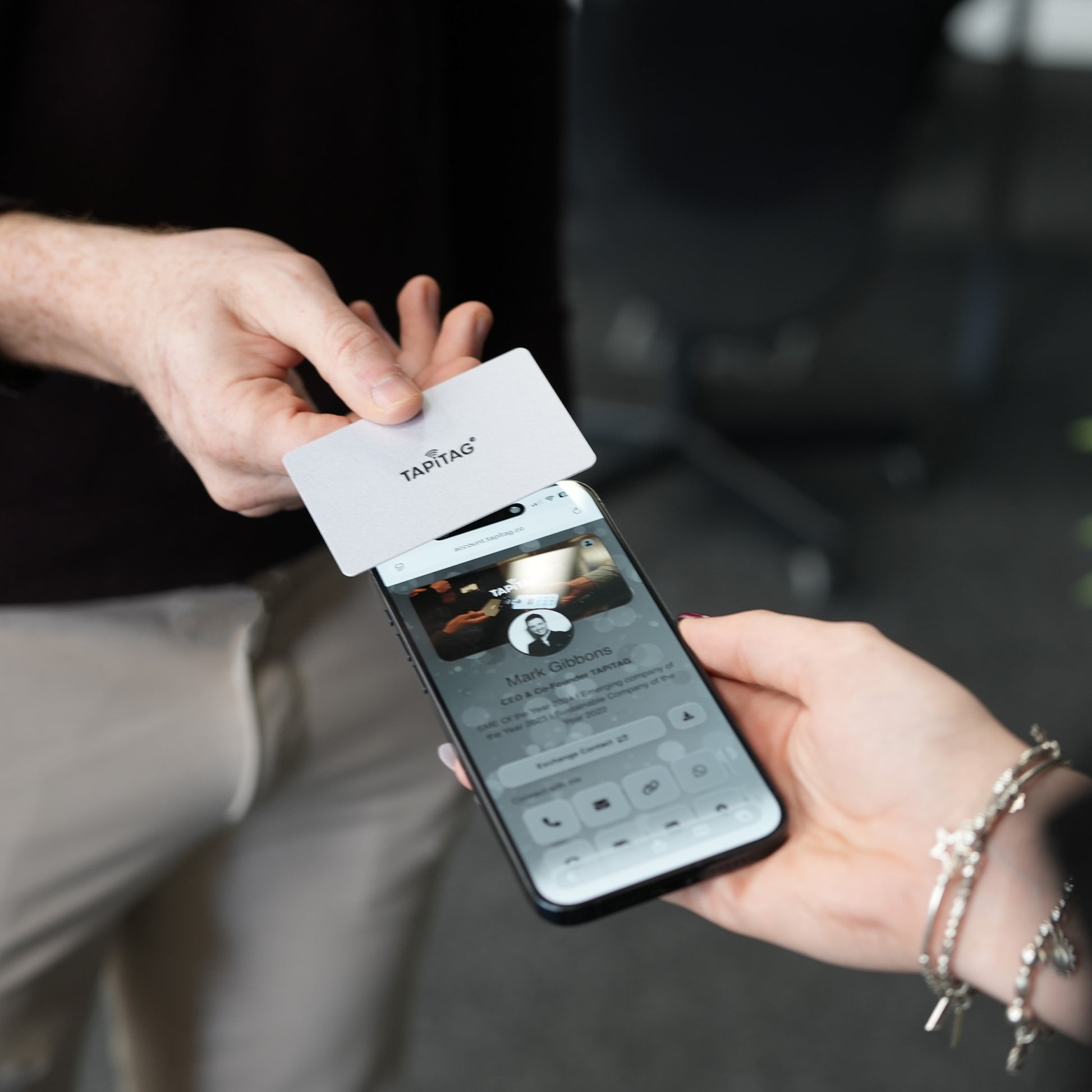 TAPiTAG Silver Digital Business Card Tapping an iPhone & sharing a TAPiTAG Profile to make a connection