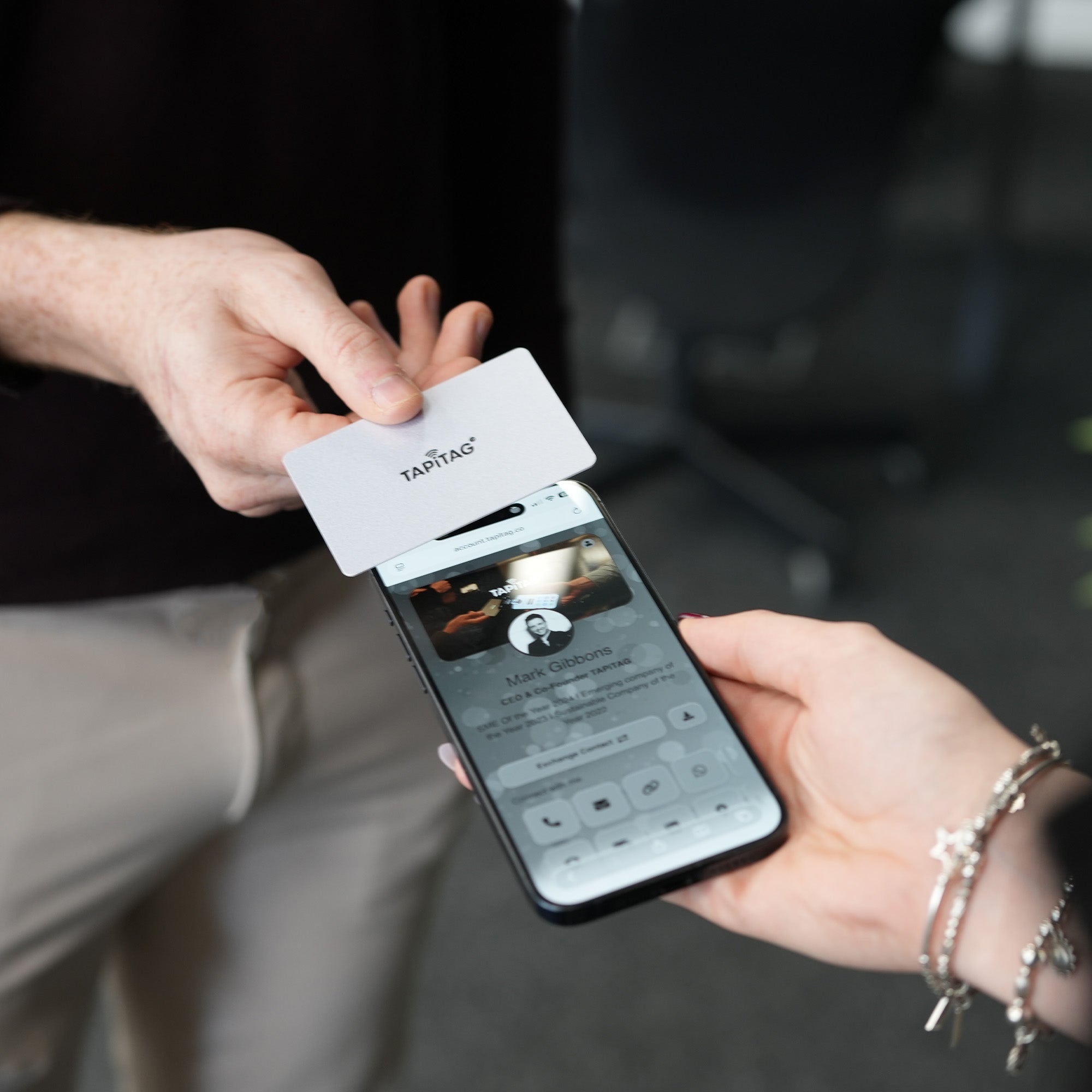 TAPiTAG Silver Digital Business Card Tapping an iPhone & sharing a TAPiTAG Profile to make a connection