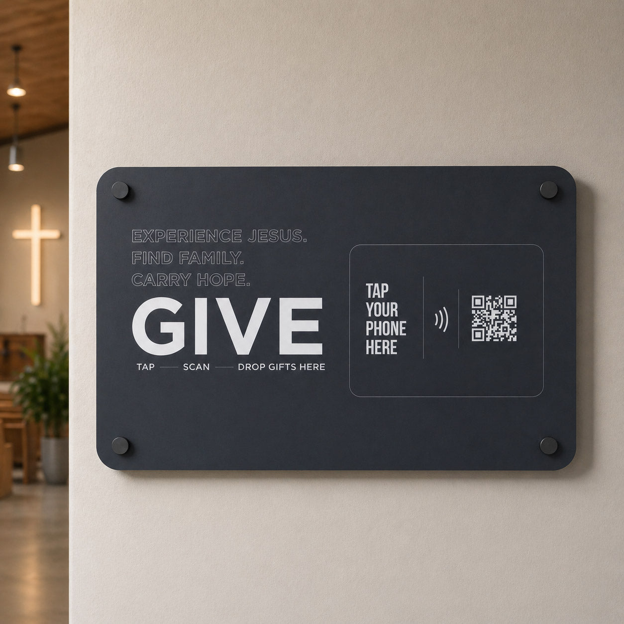 TAPiTAG Smart Display plate with QR code and text on a wall inside a building