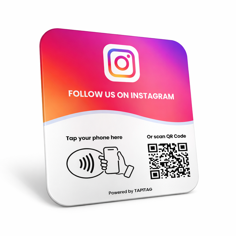 Instagram NFC tap-to-follow plate by TAPiTAG with QR code, allowing customers to tap or scan to instantly follow a business on Instagram, displayed on a white counter.