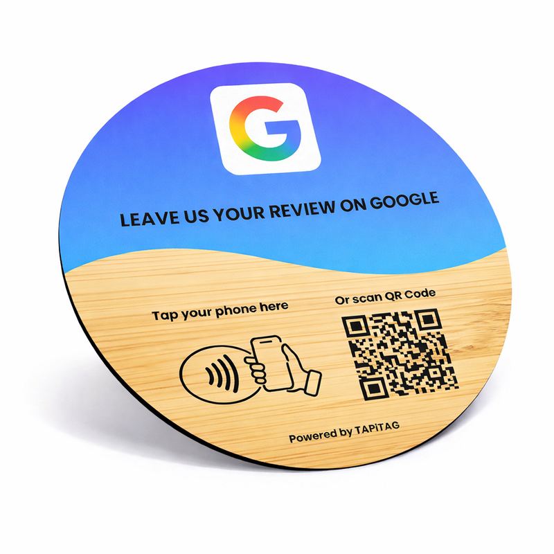 Round wooden and blue plastic disc with Google logo, QR code, and text prompting reviews.