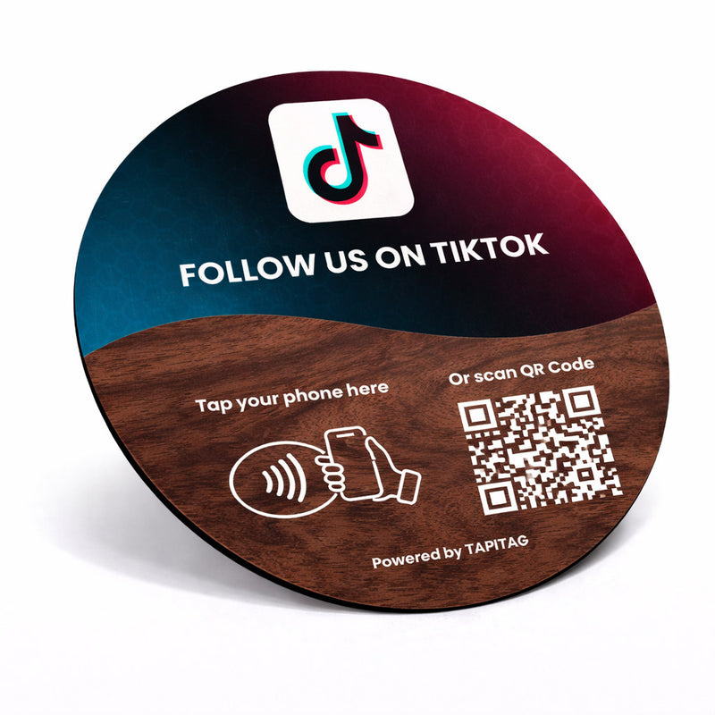 TAPiTAG Circular Walnut NFC TAG with TikTok branding and QR code for following on TikTok.