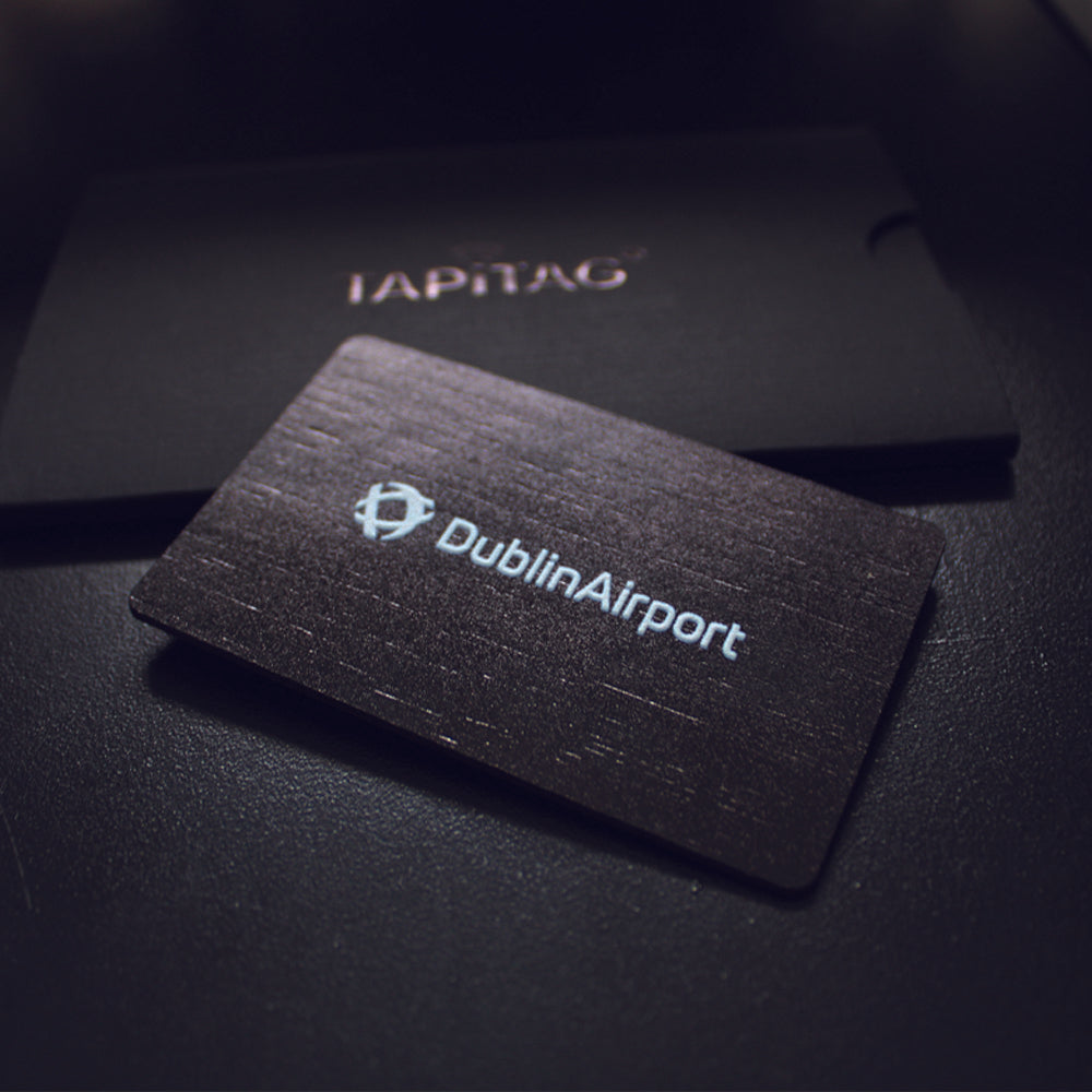 TAPiTAG Black Bamboo Digital Business Card with NFC and QR Code – An elegant business card in black bamboo, seamlessly integrating NFC and QR Code technology for efficient and stylish contact information exchange.