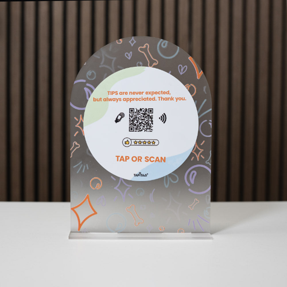 Decorative tipping tray with QR code on a plain background