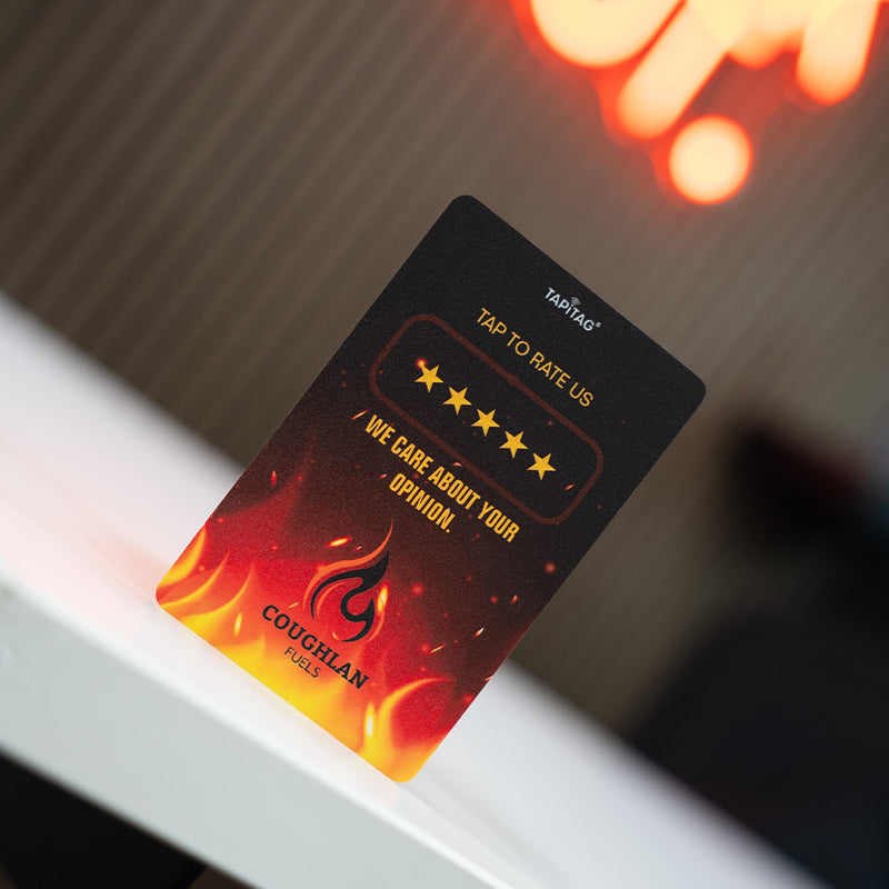 TAPiTAG Google Review Card for Coughlan Fuels product with fiery design and logo on a dark background - nfc & qr code