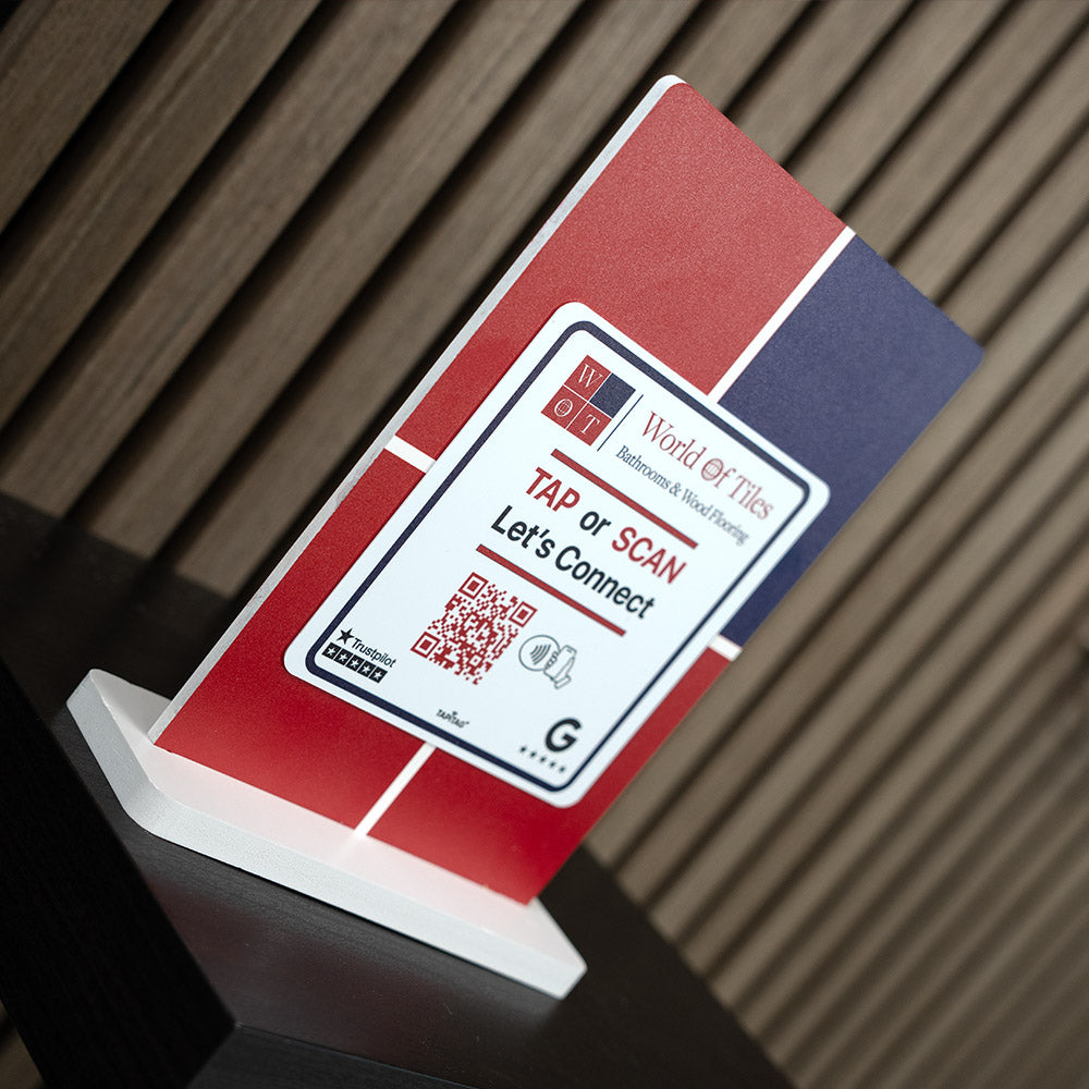 TAPiTAG Display stand with NFC TAG with QR code and branding on a wooden surface