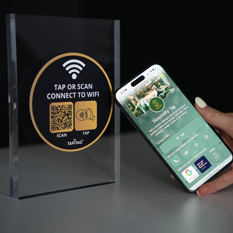 WiFi stand on a countertop allowing guests to tap or scan a QR code to connect to WiFi instantly.