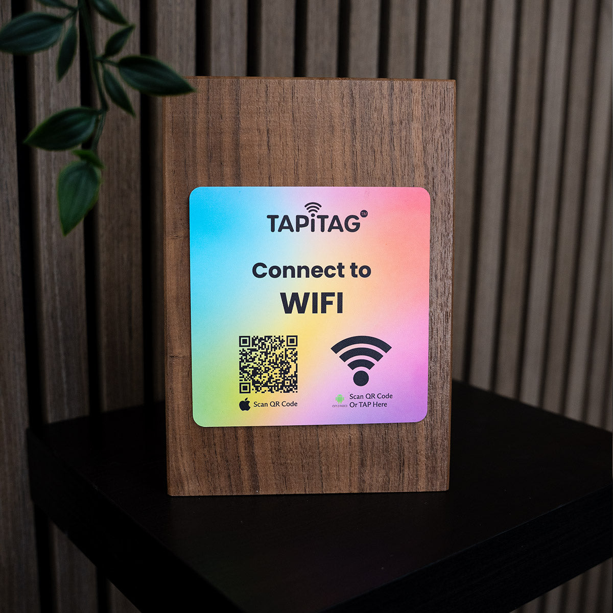  TAPiTAG wifi porter device with QR code and WiFi connectivity on a wooden surface
