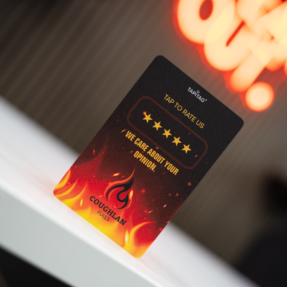 TAPiTAG Google Review Card for Coughlan Fuels product with fiery design and logo on a dark background - nfc & qr code