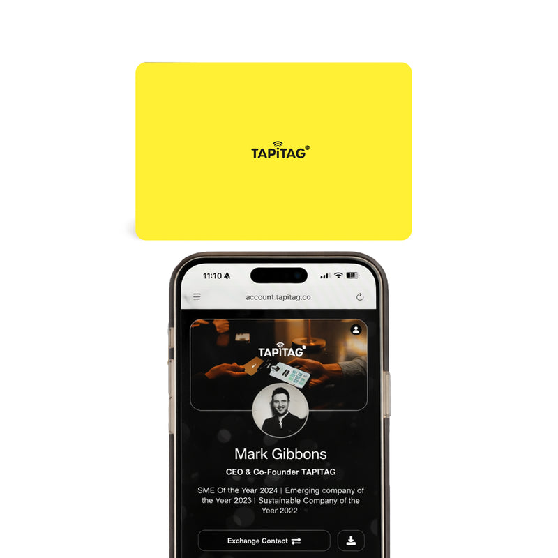 Smartphone displaying a TAPiTAG app interface with a yellow Digital Business  Card in the background