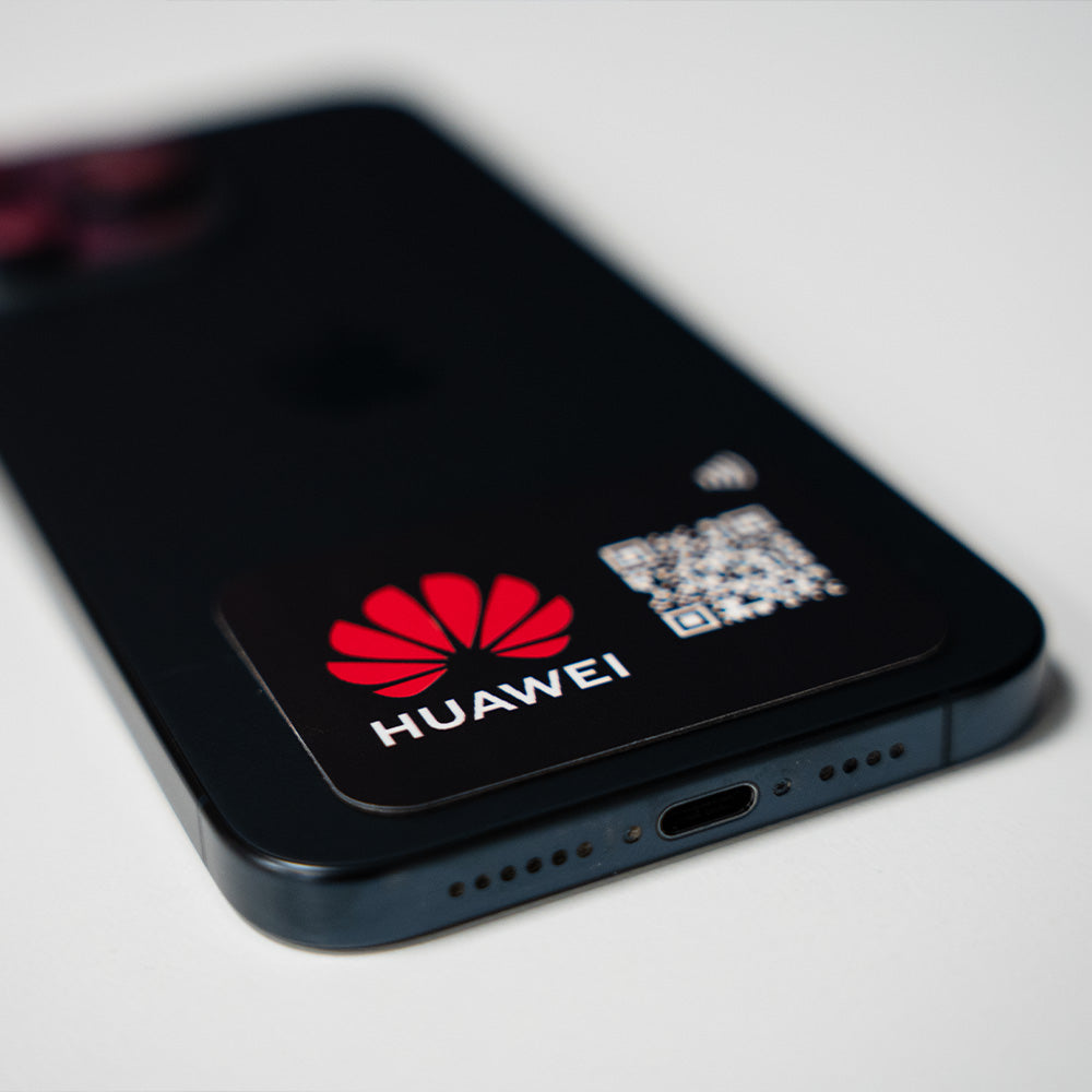Smartphone with Huawei logo and QR code on a light gray background TAPiTAG NFC QR MINICARD NFC-Enabled Digital Business Card