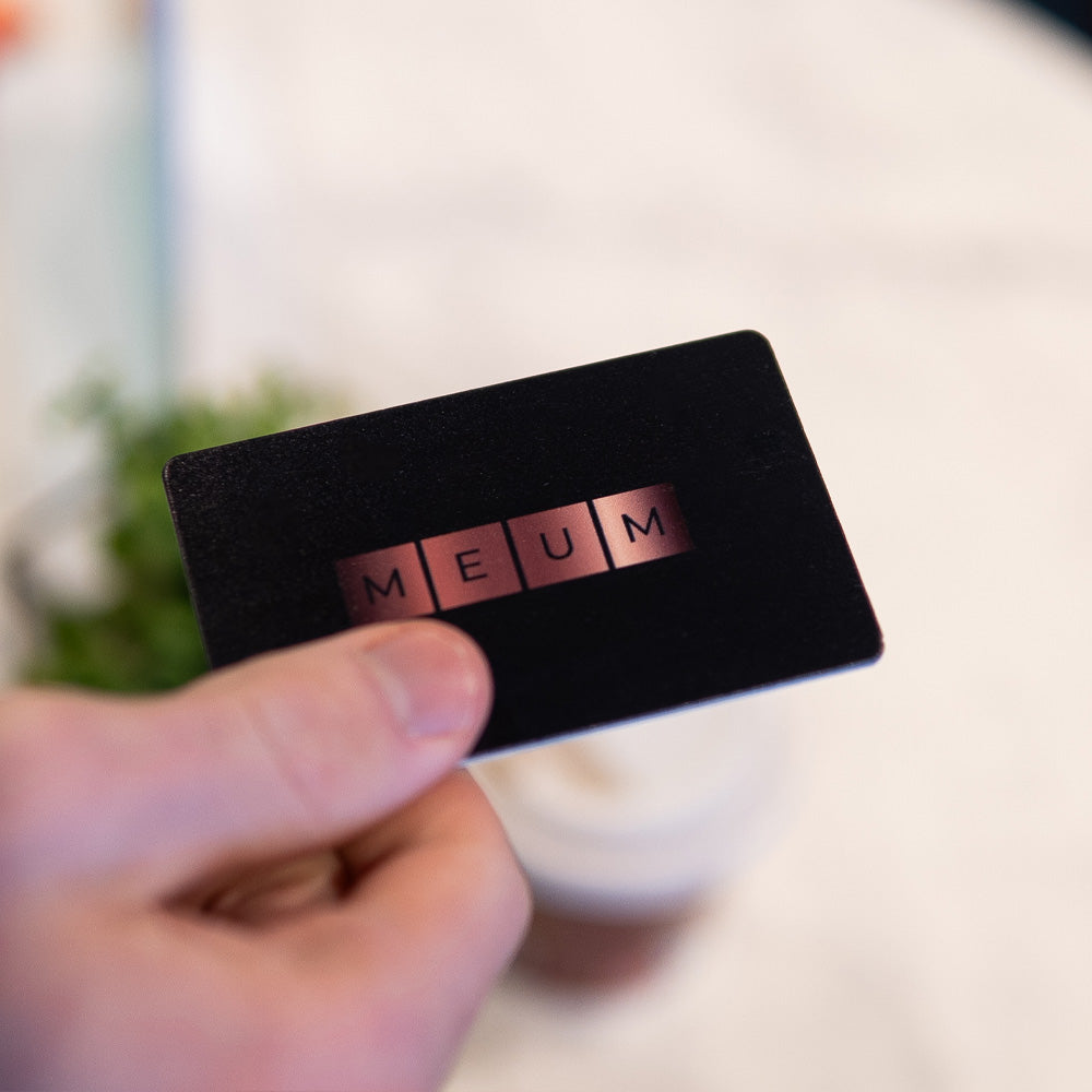 TAPiTAG Black Bamboo Digital Business Card with NFC and QR Code – An elegant business card in black bamboo, seamlessly integrating NFC and QR Code technology for efficient and stylish contact information exchange.