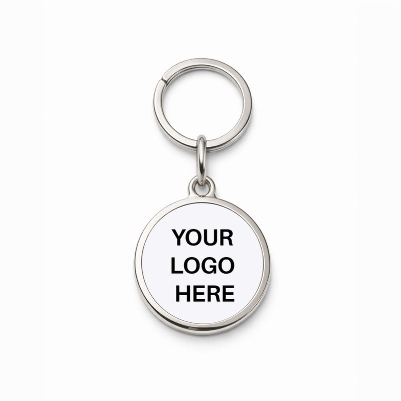 TAPiTAG Silver keychain with customizable text 'YOUR LOGO HERE' on a white background