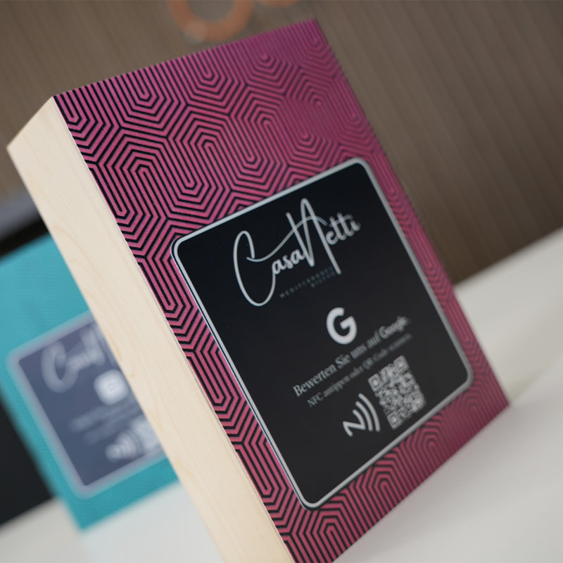 Card with 'Casa Fetti' branding and a QR code on a textured surface. TAPiTAG Digital Business Card 