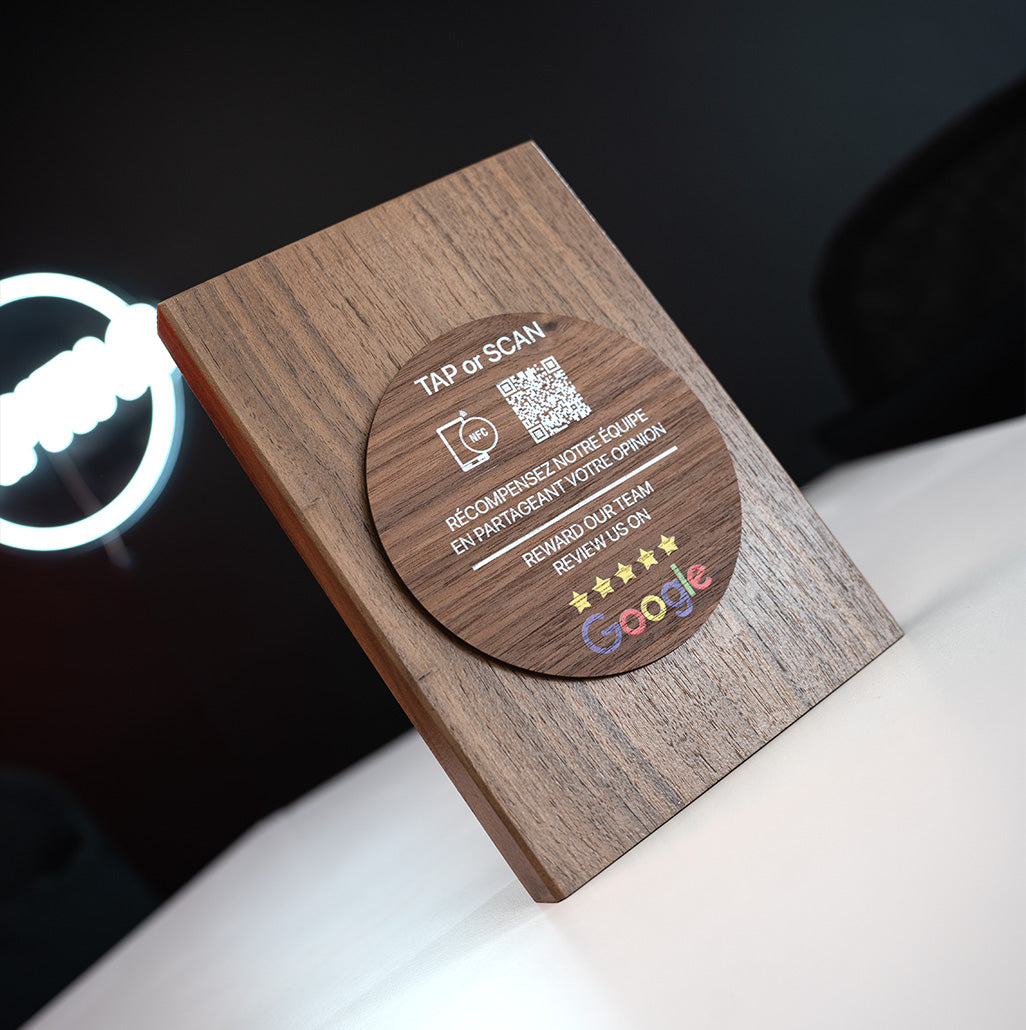 Irish Made Walnut Wood TAPiTAG plaque with nfc tag QR code and text on a dark background