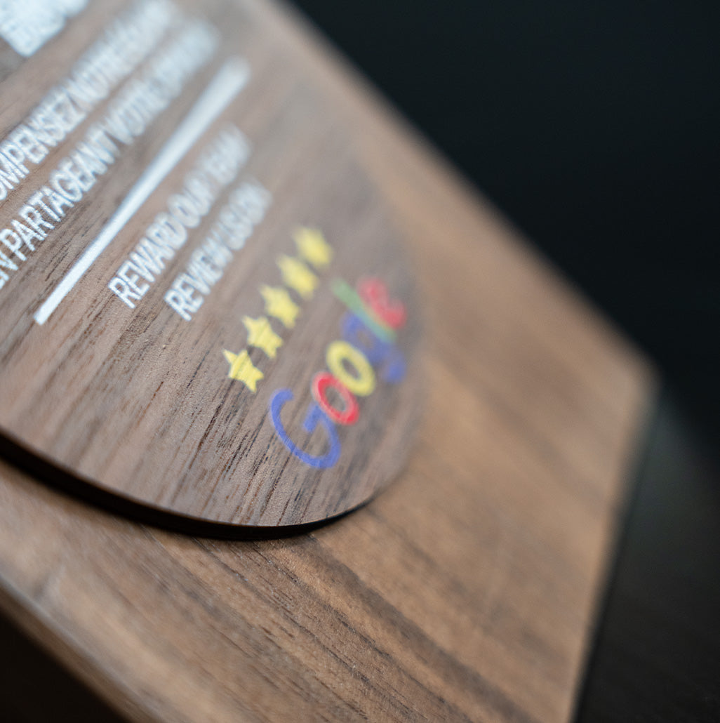 Irish Made Walnut Wood TAPiTAG plaque with nfc tag QR code and text on a dark background