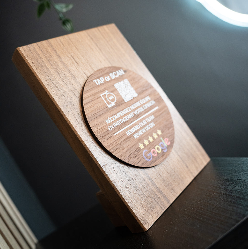 Irish Made Walnut Wood TAPiTAG plaque with nfc tag QR code and text on a dark background