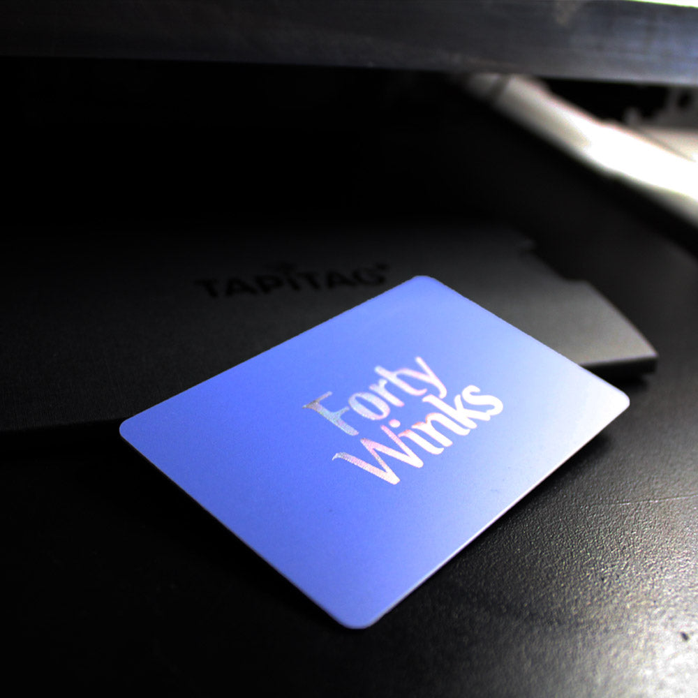 blue TAPiTAG NFC-Enabled Digital Business Card with silver foil print