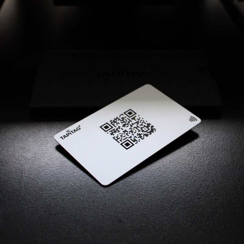Front of white PVC digital business card with QR code 